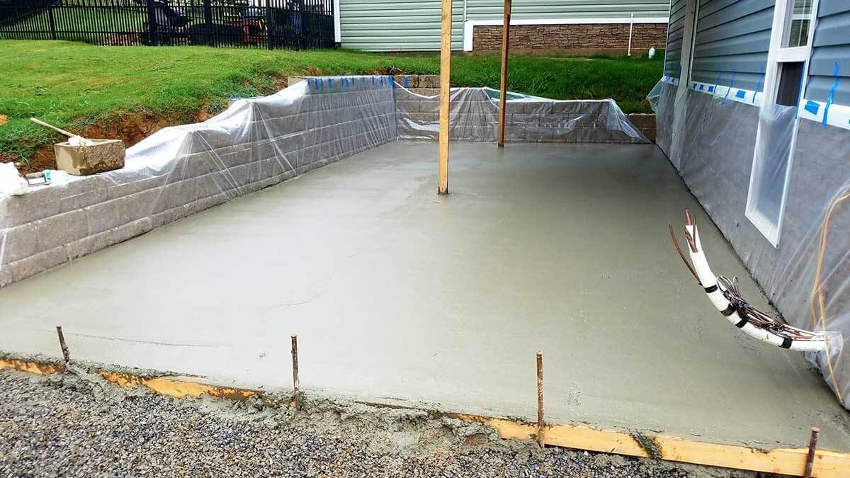 Freshly poured concrete that is smoothly leveled 